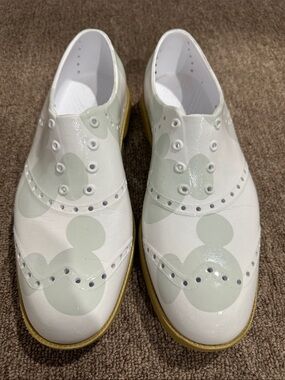 Women's White Slip-On Wingtip Sneakers with Pale Green Accents